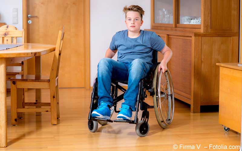 Junge im Rollstuhl Junge im Rollstuhl